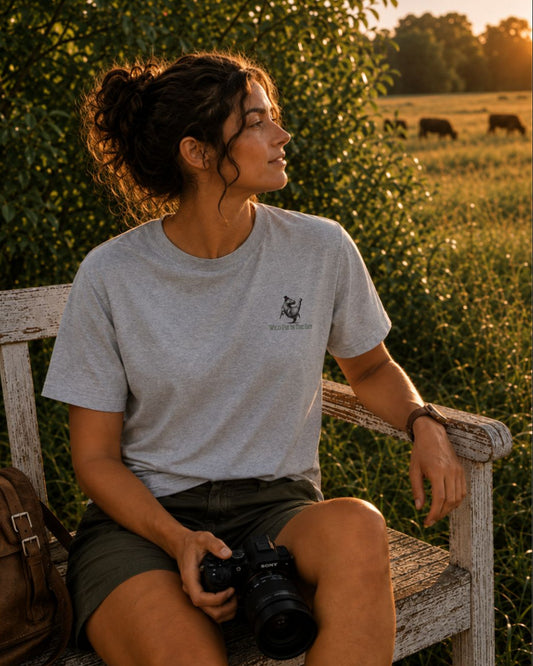 Oversized grey organic cotton unisex wildlife t-shirt featuring small dancing hippo chest graphic