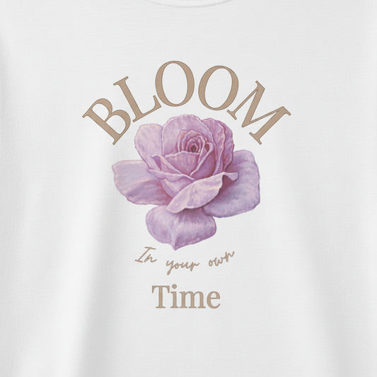 Oversized white organic cotton unisex wildlife t-shirt featuring flower chest graphic