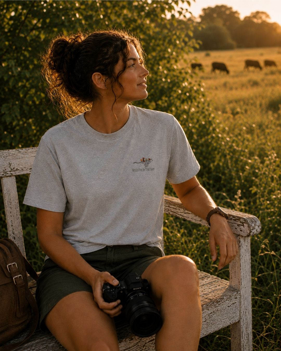 Oversized grey organic cotton unisex wildlife t-shirt featuring small  cheetah wearing a rocket chest graphic