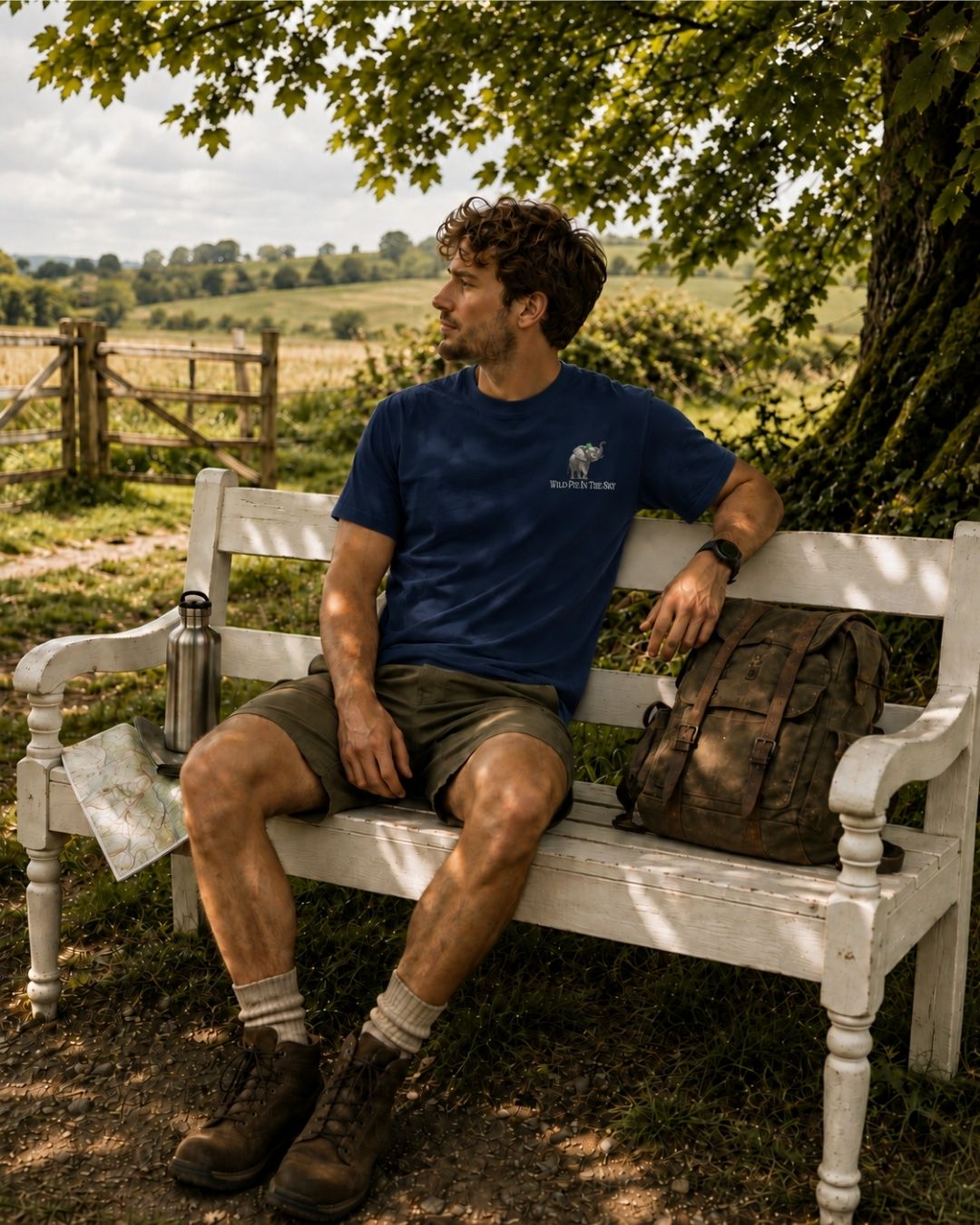 Oversized navy organic cotton unisex wildlife t-shirt featuring small  elephant chest graphic