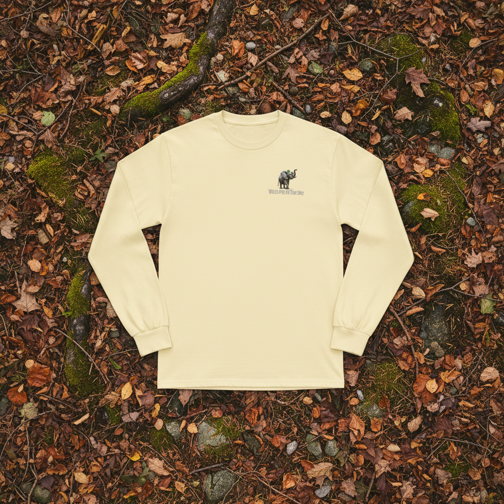 Butter yellow cotton long sleeve wildlife t-shirt featuring small elephant chest graphic
