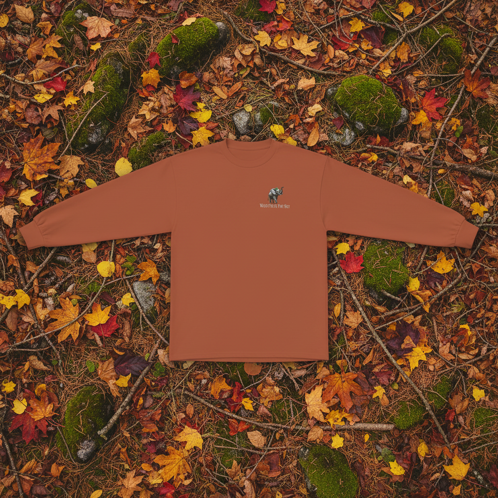 Clay brown cotton long sleeve wildlife t-shirt featuring small elephant chest graphic