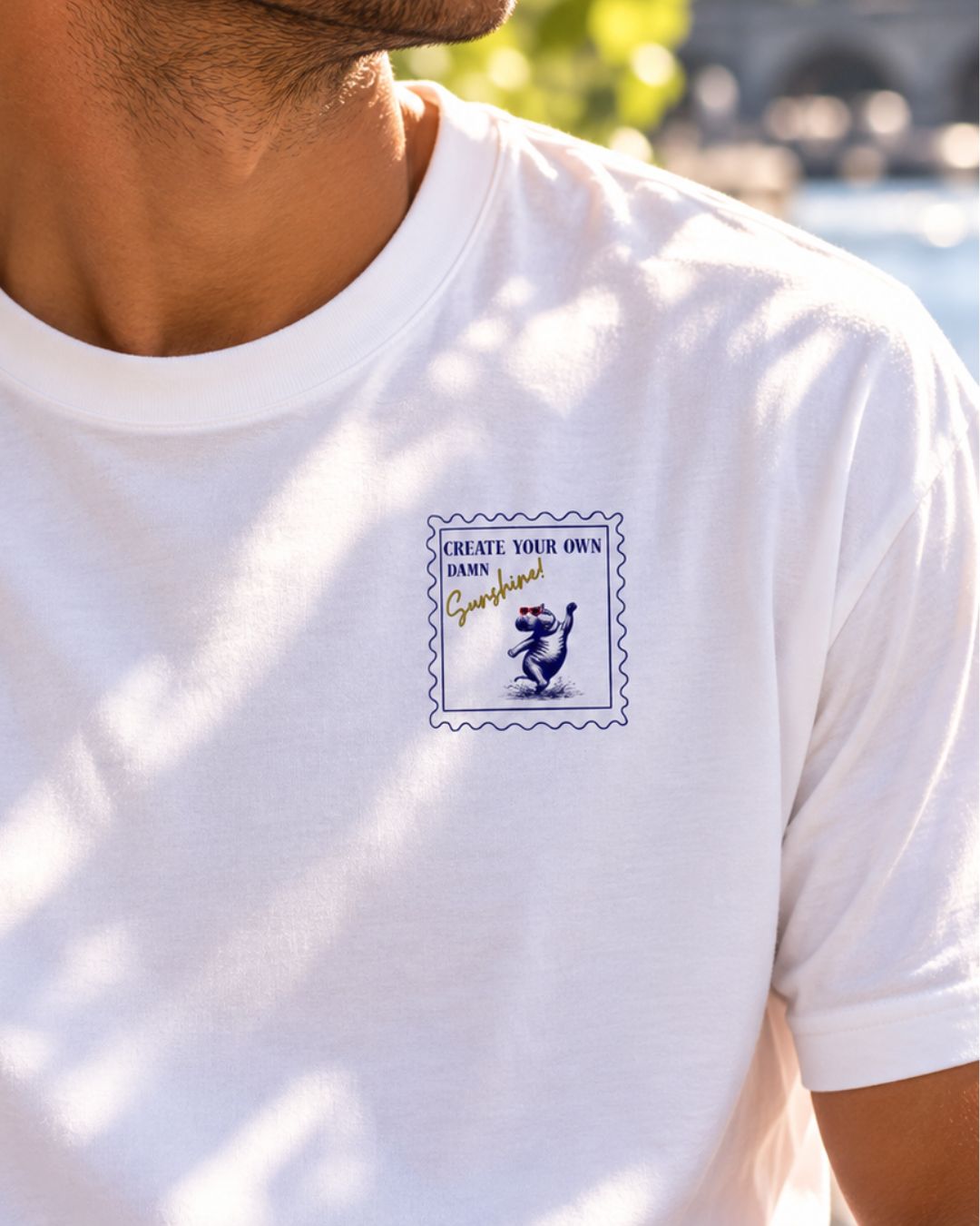 Oversized white unisex organic cotton unisex wildlife t-shirt featuring a dancing hippo graphic on the left chest