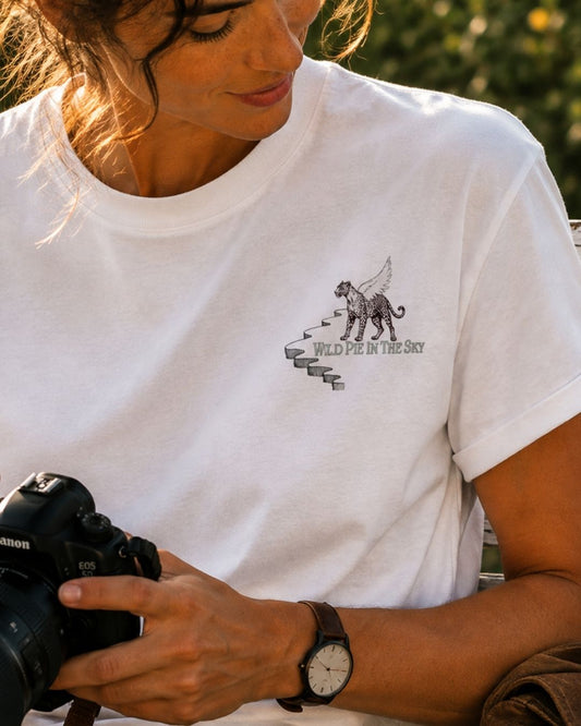 Oversized white organic cotton unisex wildlife t-shirt featuring small  leopard chest graphic