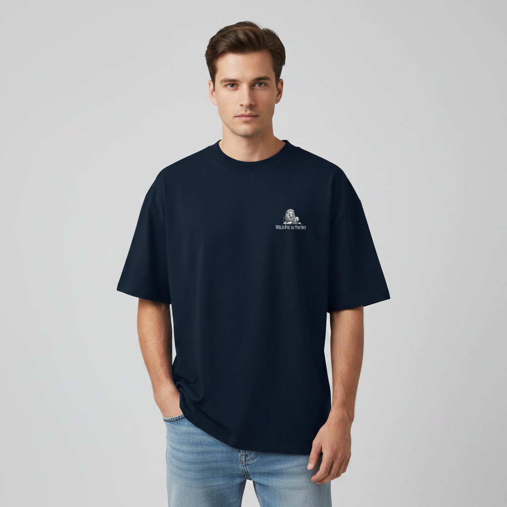 Oversized navy organic cotton unisex wildlife t-shirt featuring small  lion chest graphic