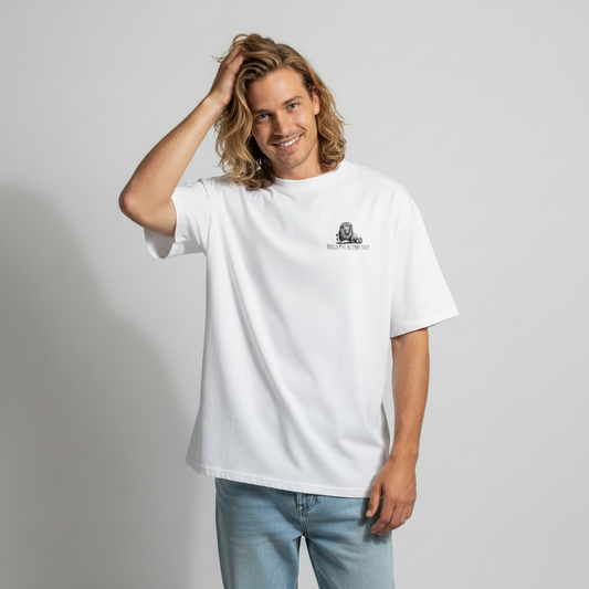 Oversized white organic cotton unisex wildlife t-shirt featuring small  lion chest graphic
