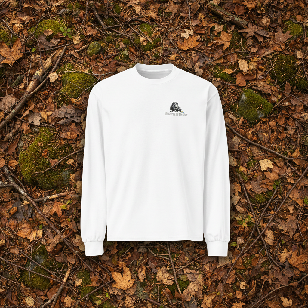 White cotton long sleeve wildlife t-shirt featuring small lion chest graphic