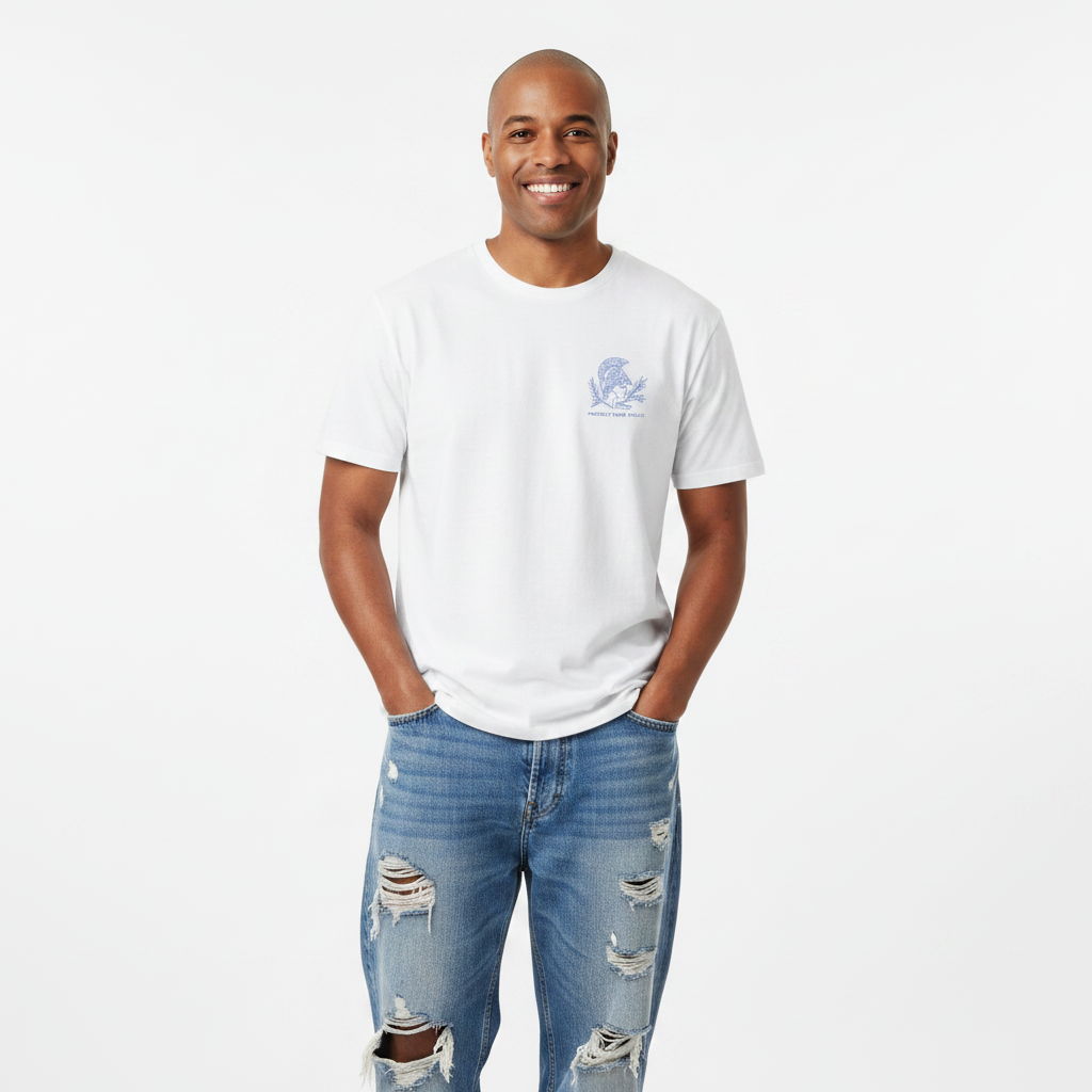 Man wearing Unisex organic cotton nature inspired t-shirt with protect your peace design – sustainable clothing 