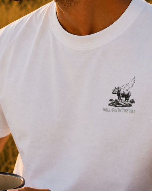 Oversized white organic cotton unisex wildlife t-shirt featuring small  winged rhino chest graphic