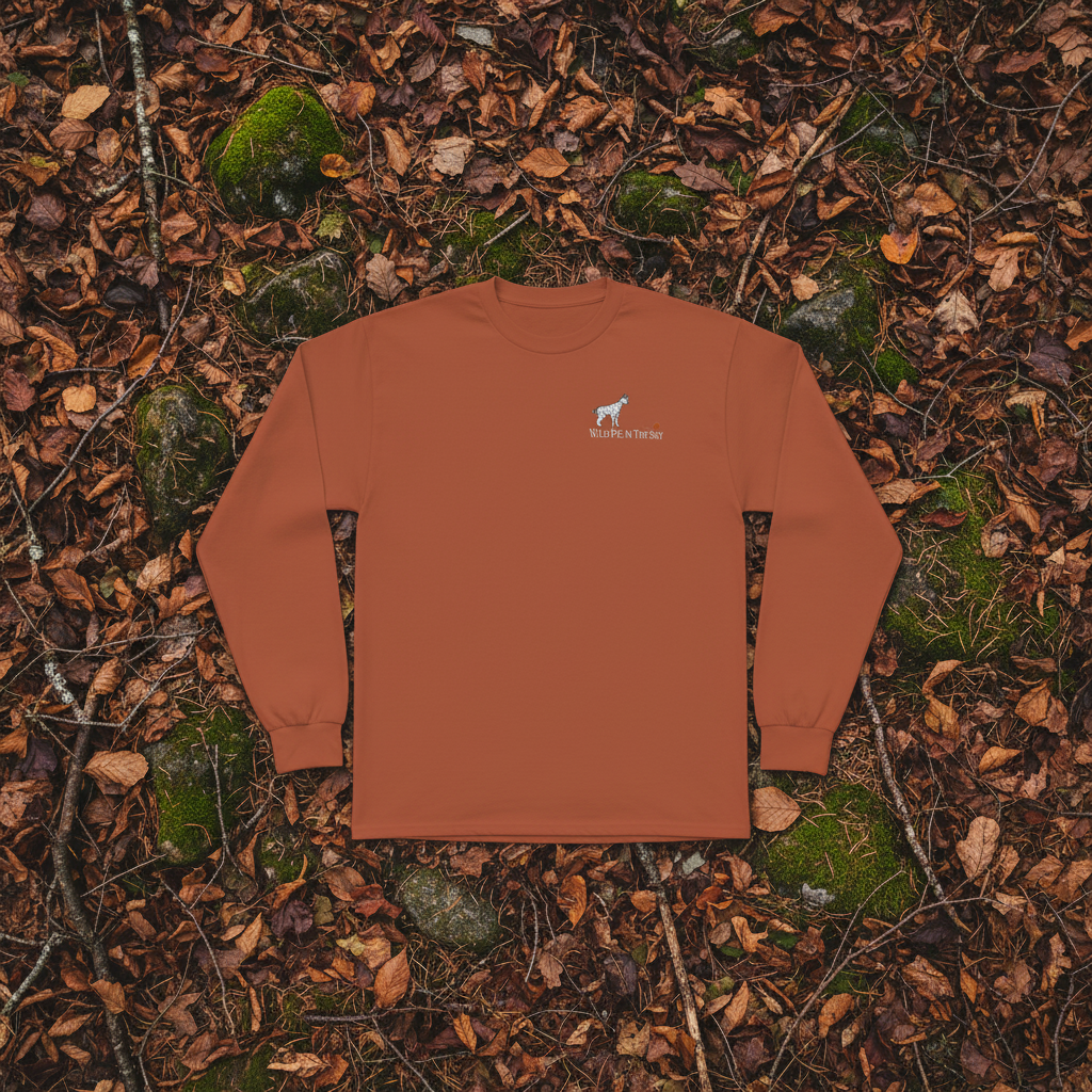 Clay brown cotton long sleeve wildlife t-shirt featuring small serval cat chest graphic