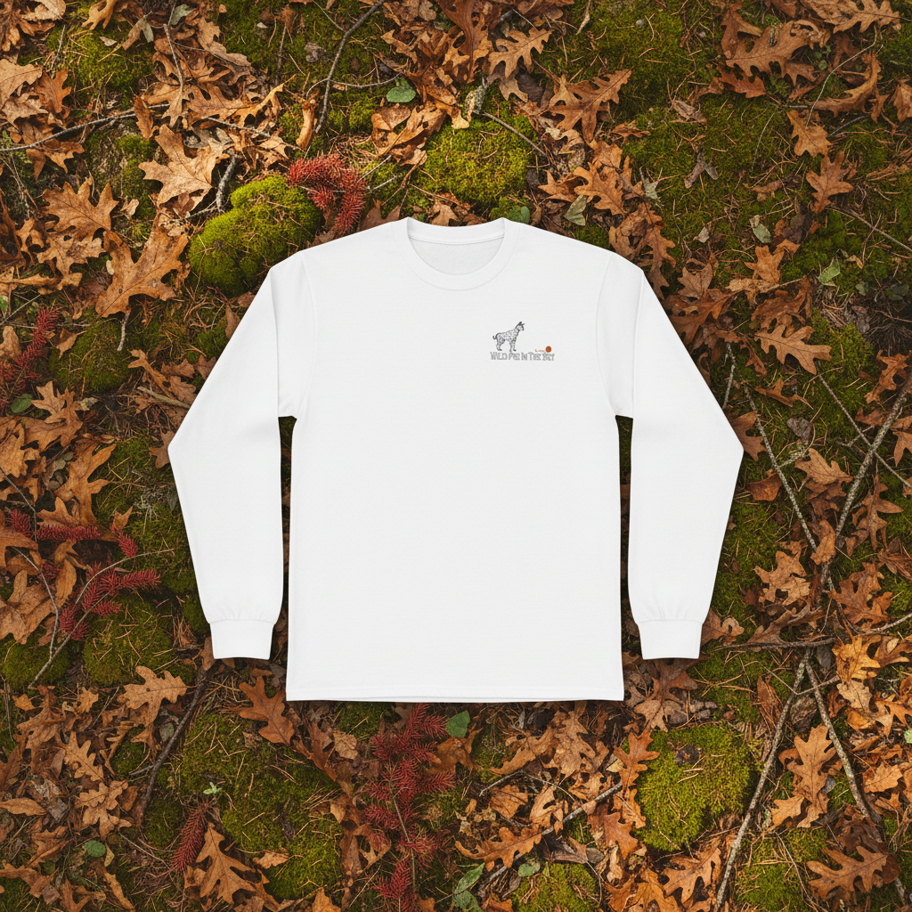 White cotton long sleeve wildlife t-shirt featuring small serval cat chest graphic
