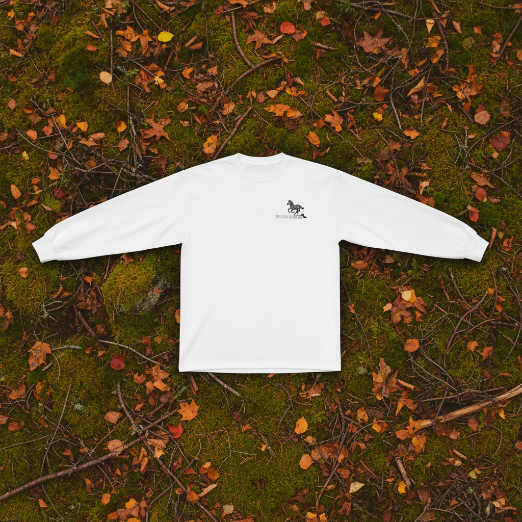 White cotton long sleeve wildlife t-shirt featuring small zebra chest graphic